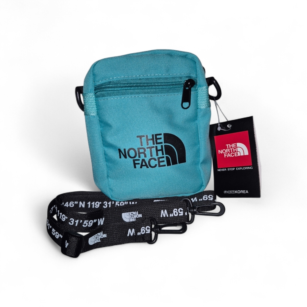 The North Face Teal Crossbody Bag with Black Strap
